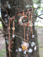 Load image into Gallery viewer, Citrine crystal hand wrapped in copper wire hanging from wrapped crescent moon shaped abalone shell corresponding chain with stars. Matching citrine and copper earrings.  
